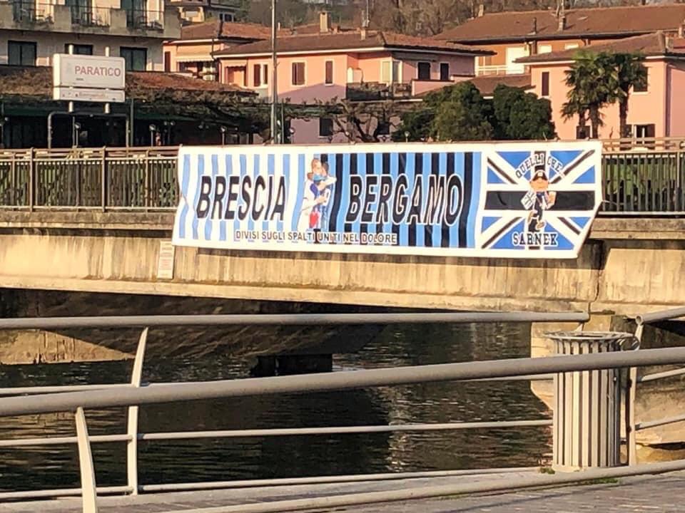 Brescia e Bergamo restano unite nel dolore: nuovo striscione sul ponte